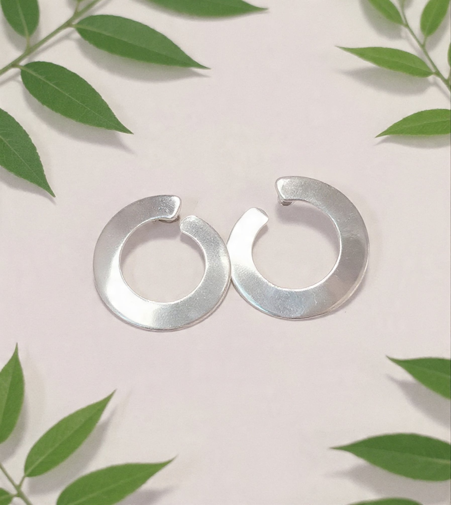 Broken circles in sterling silver